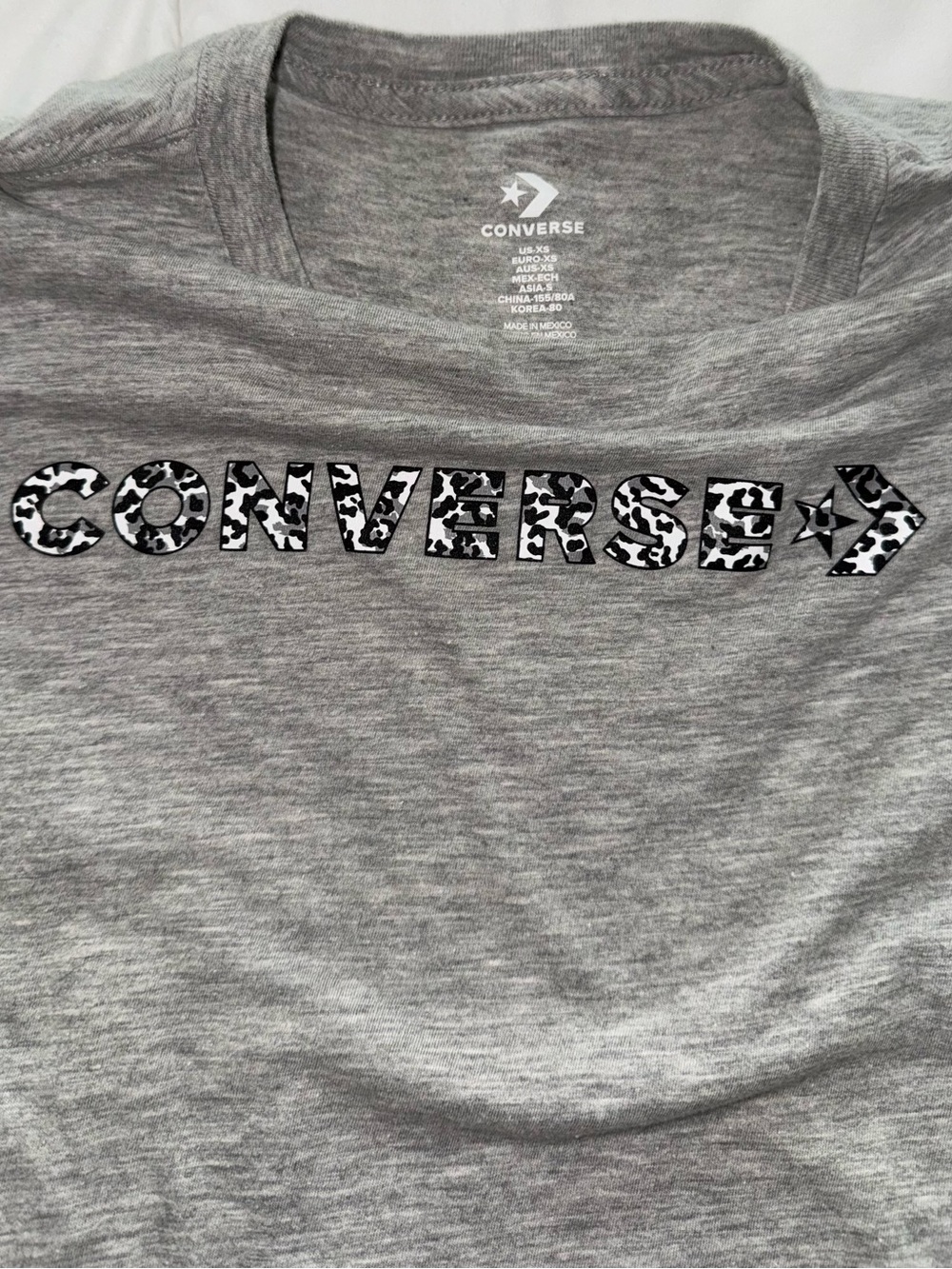 Women’s leopard print converse tee